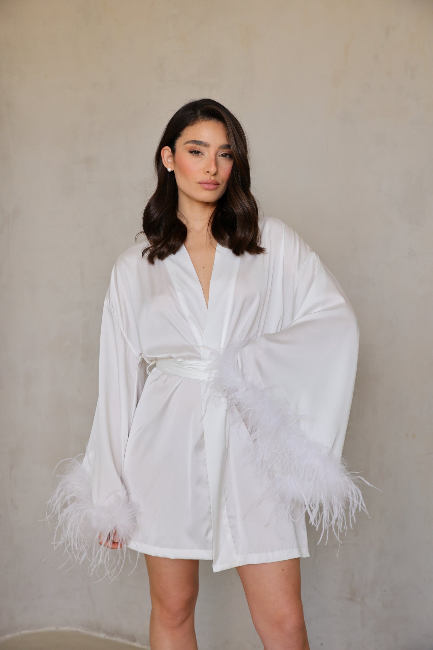 Mid-length front view of Swan robe with sleeves relaxed.