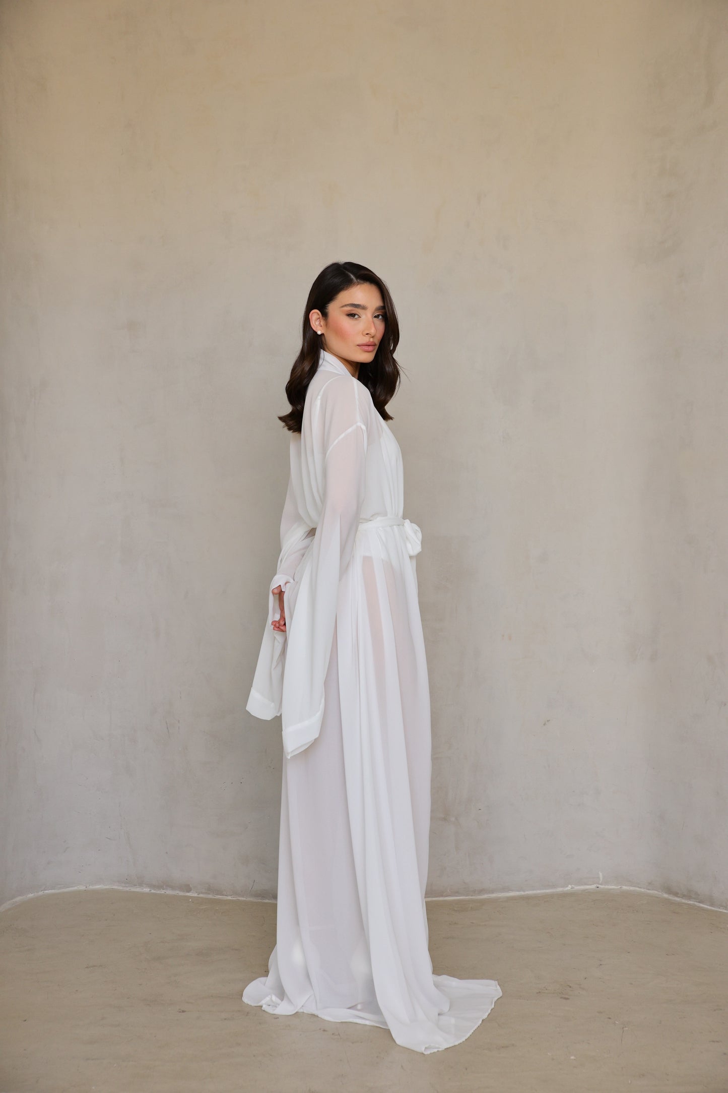 Angel Robe — three-quarter left view showing floor length and airy silhouette.