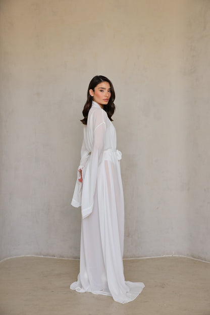 Angel Robe — three-quarter left view showing floor length and airy silhouette.