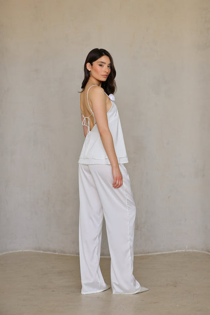 angle-miss-mariee.jpg	Ivory Rose satin pants front angle—model slightly turned with hand on hip