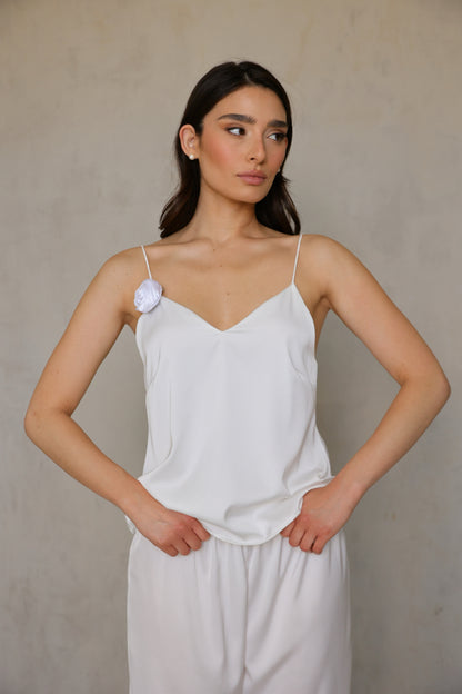 Model wearing Ivory Rose satin camisole – relaxed waist-up front view